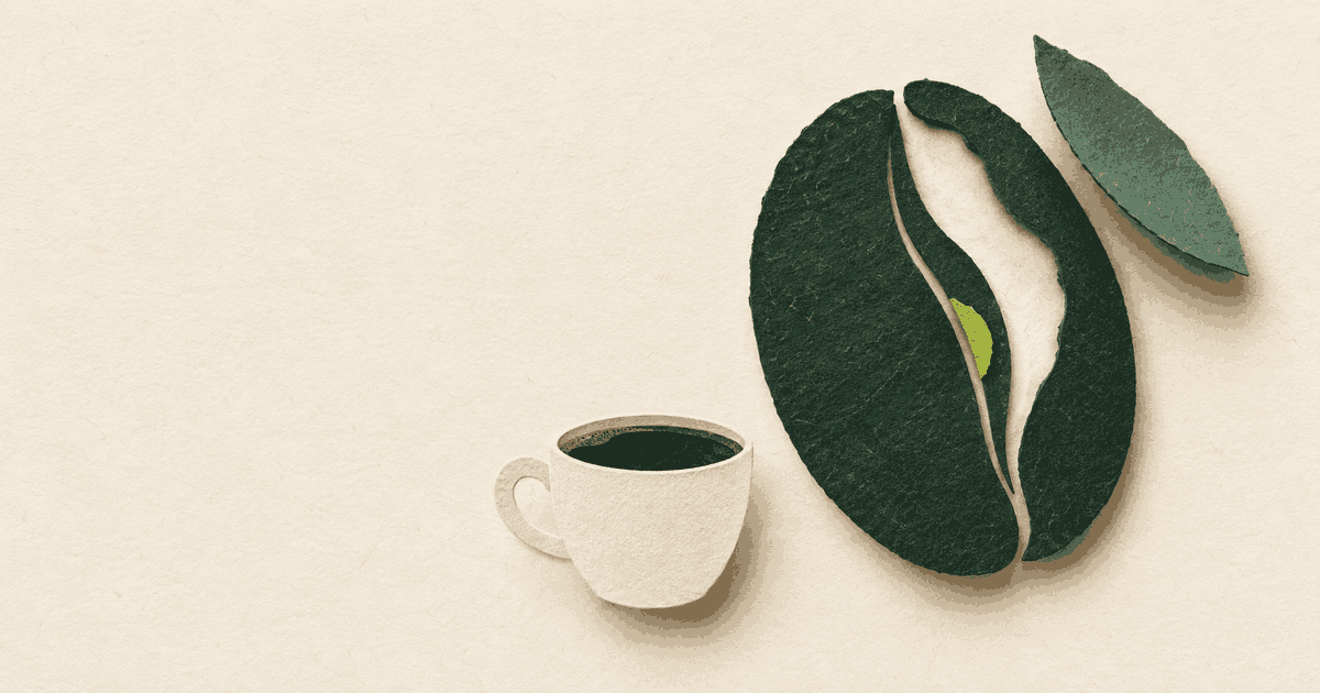 Paper-cut coffee bean with a lifted layer, one lime fragment remaining inside, and a small cup below